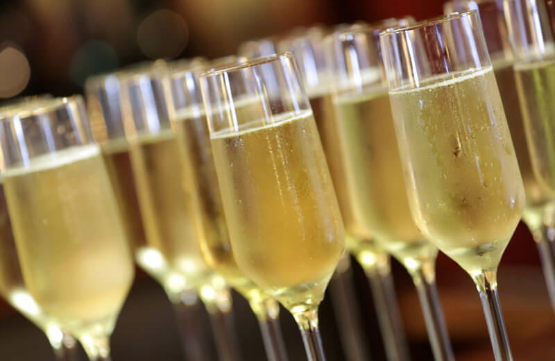 full champagne glasses